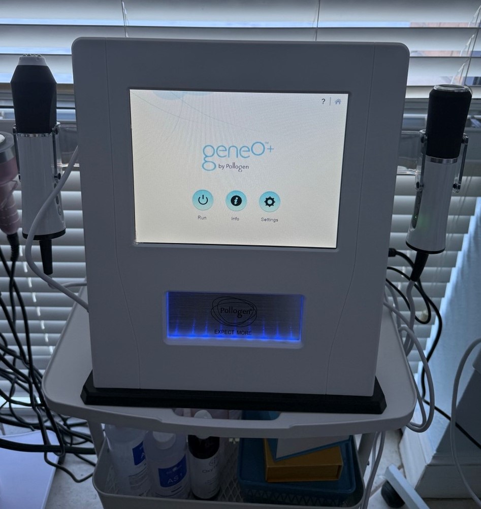 Esthetician using Oxygeno device for facial treatment with serum infusion.  